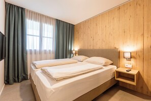 Ferienwohnung mit 2 Schlafzimmern | ベビーベッド、WiFi (無料)、ベッドシーツ