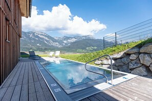 Superior Ferienhaus mit 4 Schlafzimmern, Sauna & Pool | Terrace/patio - Bergresort Hauser Kaibling by ALPS RESORTS (Haus)