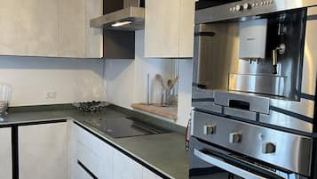 Villa, Garden View | Private kitchen | Full-sized fridge, microwave, oven, dishwasher