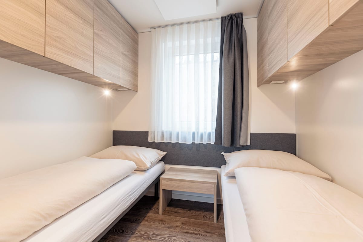 Chalet mit 2 Schlafzimmern | เปล/เตียงเด็กอ่อน, Wi-Fi ฟรี, ผ้าปูที่นอน