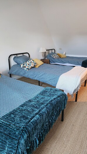 2 bedrooms, desk, travel crib, bed sheets