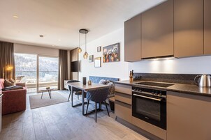 Ferienwohnung mit 1 Schlafzimmer | Cocina privada | Máquina de café espresso, frigorífico grande, horno y placa de cocina