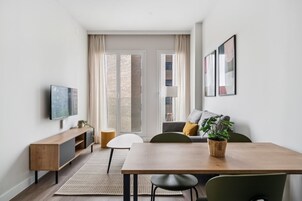 Apartment, 1 Bedroom | Living area | 35-inch Smart TV with digital channels