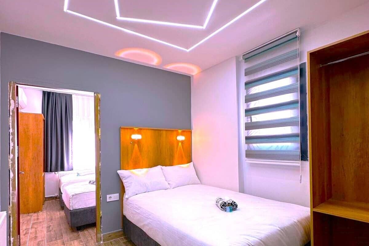 Deluxe Triple Room | Egyptian cotton sheets, premium bedding, Tempur-Pedic beds, minibar