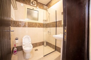 Shower, hair dryer, slippers, towels