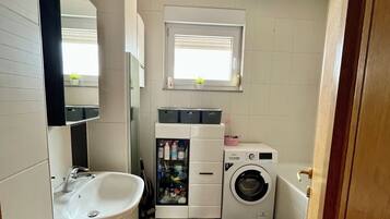 Hair dryer, towels, soap, shampoo