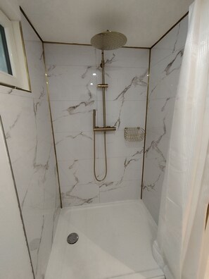 Hair dryer, towels, soap, shampoo