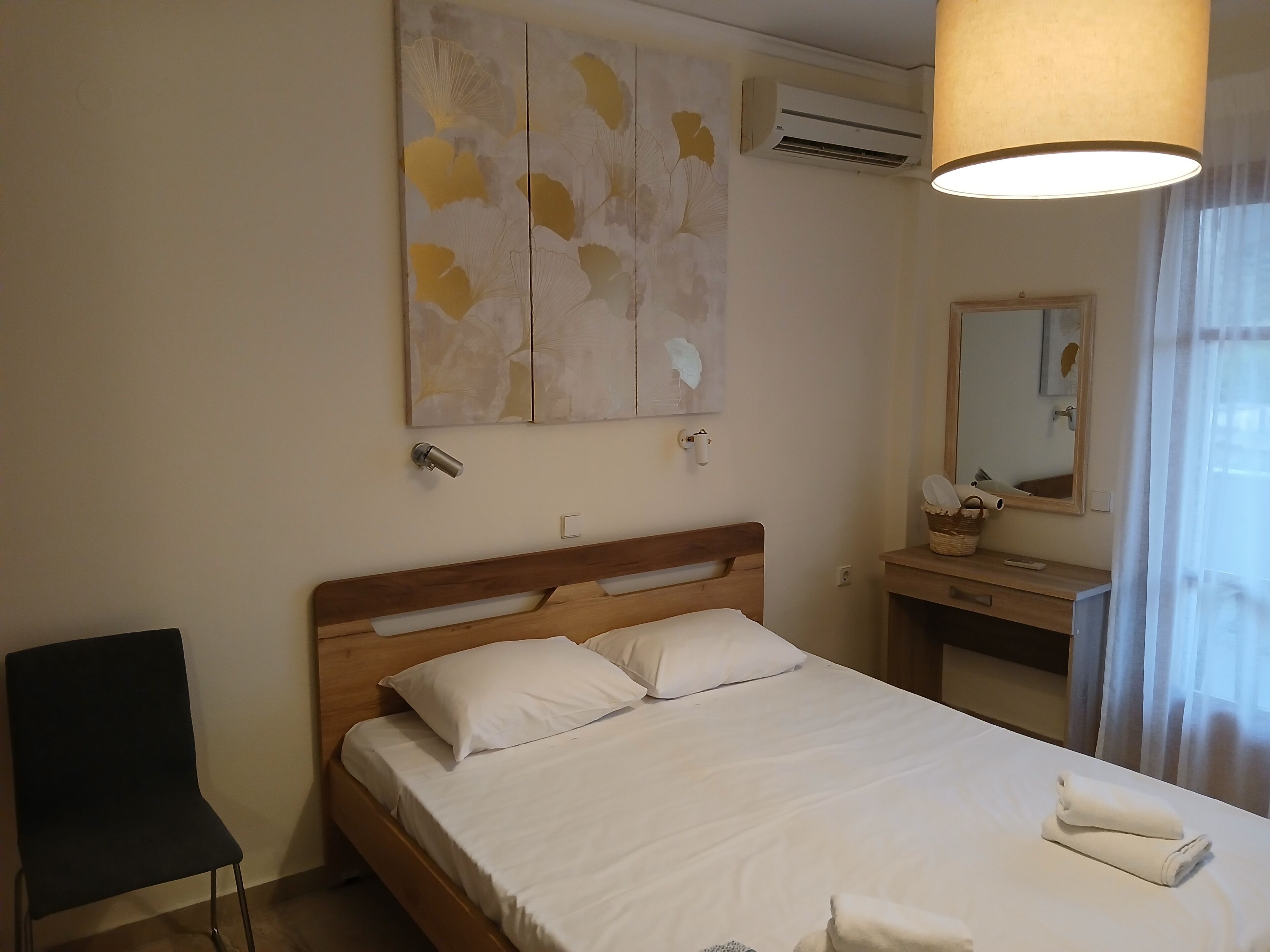 Deluxe Double Room, Balcony, Partial Sea View | In-room safe, blackout curtains, iron/ironing board, free WiFi