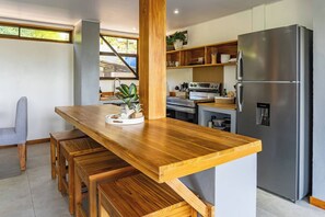 Fridge, microwave, oven, stovetop - Charming 1st Floor Villa in Serene Camaronal (Camaronel)