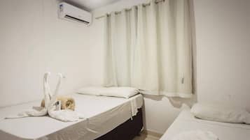 Apartamento, 2 quartos | Wi-Fi de cortesia, roupa de cama