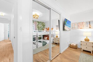 4 bedrooms, desk, iron/ironing board, travel crib