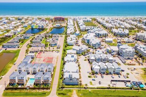 Stunning coastal neighborhood with a mix of modern and traditional homes, offering easy access to the beach and green spaces.