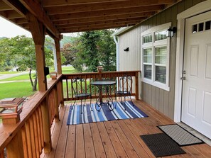 Outdoor dining - Cozy 1-bedroom house in charming Marion NC with WiFi, AC, and a covered porch (Marion)