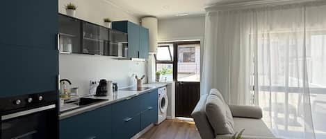Appartement Ville, vue ville | Coin séjour | Télévision à écran plat