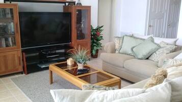 Villa, Multiple Beds, Pool Access, Garden View (5 Bed Florida Villa - West Haven) | Living area | 42-inch flat-screen TV with digital channels, DVD player, MP3 dock