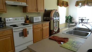 Villa, Multiple Beds, Pool Access, Garden View (5 Bed Florida Villa - West Haven) | Private kitchen | Fridge, microwave, oven, stovetop