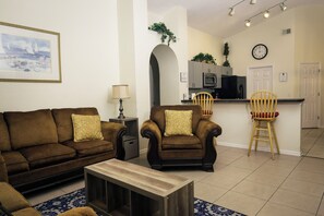 Villa, Multiple Beds, Pool Access, Pool View (4 Bed Villa - Eagle Pointe - Kissimm) | Living area | 42-inch flat-screen TV with digital channels