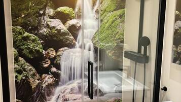 Shower, hair dryer, towels, toilet paper