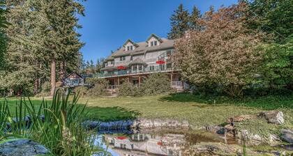 Family friendly water view escape with deck, games and garden views