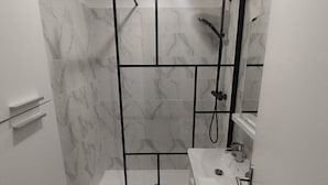 Hair dryer, towels, soap, toilet paper