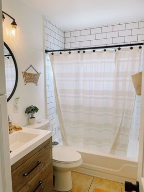 Hair dryer, towels, soap, toilet paper