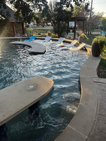 Outdoor pool. 8 min to Rocker B - Cozy Lakefront Escape at PK Lake