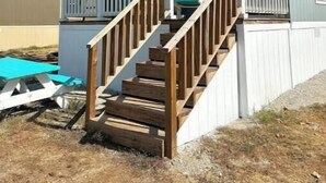 A small, single-story building with a porch and a staircase leading to a deck. - 8 min to Rocker B - Cozy Lakefront Escape at PK Lake  (Graford)