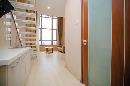 Fuzhen Hotel Apartment