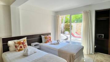 Quadruple Room, Pool View | In-room safe, blackout drapes, free WiFi