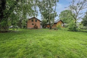 Exterior - Cozy Urban Cottage | Bright, Peaceful Retreat Near Queen’s, Downtown & Airport (Kingston)