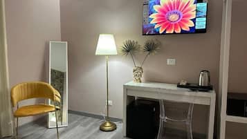 Luxury Room, 1 Bedroom, Balcony, City View | Minibar, in-room safe, desk, laptop workspace