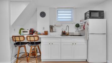 Fridge, microwave, dishwasher, coffee/tea maker