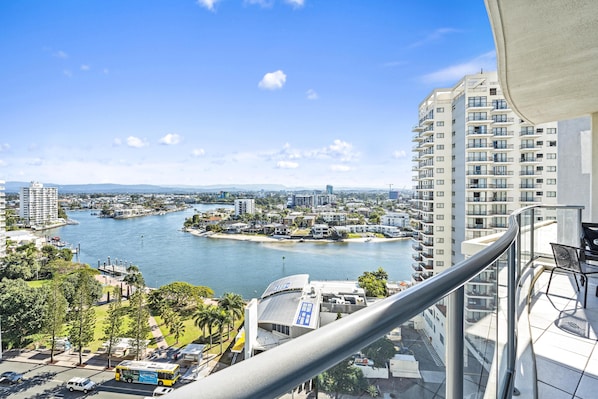 Enjoy breathtaking views of the river and city from your balcony.