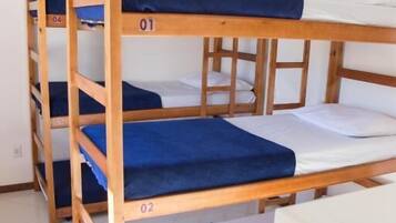 A bunk bed room with three levels, numbered 01, 02, and 03.