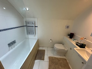 Hair dryer, towels, soap, toilet paper