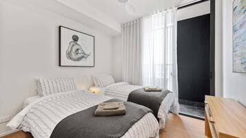 2 bedrooms, desk, iron/ironing board, travel crib