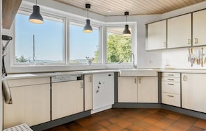 Fridge, dishwasher, coffee/tea maker, cookware/dishes/utensils
