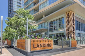 Hunters Landing features a contemporary architectural style with large glass windows and a flat roof.