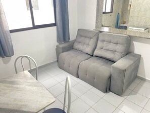 Apartment | Living area | 32-inch flat-screen TV with satellite channels, TV, streaming services