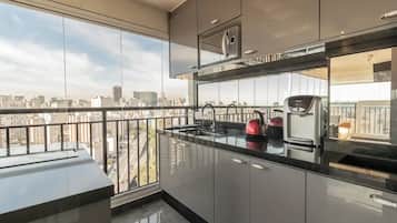 Fridge, microwave, stovetop, coffee/tea maker