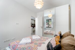 2 slaapkamers, een strijkplank/strijkijzer, gratis wifi, beddengoed