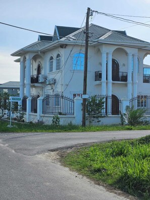 Exterior - Charming Modern House In Residential Providence Hot-W/Wi-Fi/AC, Live/Secure Cam (GEORGETOWN)