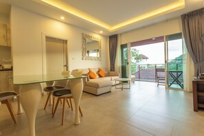 Basic Condo, Mountain View | Living area | Flat-screen TV - 2Beds Award Winning Nai Han Beach c126 (Rawai)