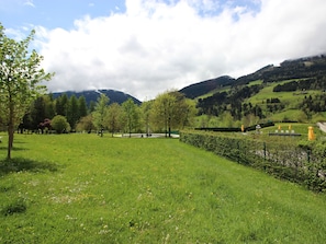 Surrounded by lush trees and rolling hills, this serene setting offers a peaceful escape.
