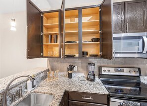 Private kitchen - Lavish one bedroom apartment in downtown Birmingham with rooftop stadium views. (Birmingham)
