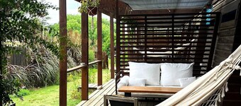 Cozy studio DUNA in La Pedrera with AC, WiFi, front deck on a garden