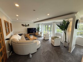 Deluxe Apartment, Non Smoking, Park View | Living area | 65-inch flat-screen TV with digital channels, TV, Netflix