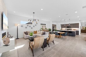 Smart TV, fireplace, books, stereo