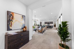 Smart TV, fireplace, books, stereo