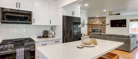 Fridge, microwave, stovetop, coffee/tea maker